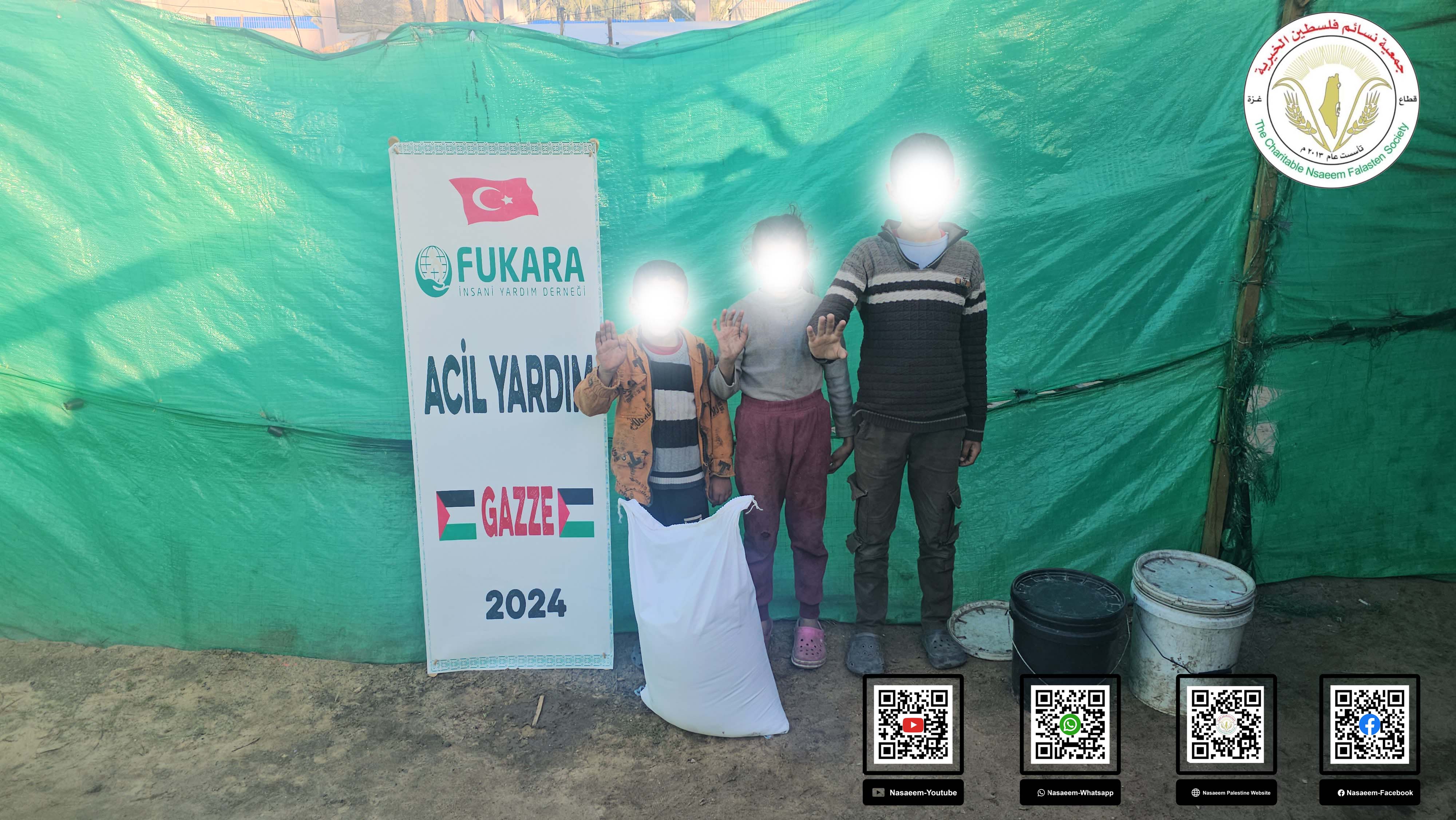مشروع توزيع الطحين على الأسر النازحة بغزة
